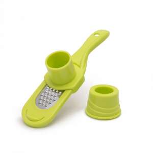 Green garlic grater with stainless steel grater surface, ergonomic handle, and a removable container for easy cleaning - Flat file