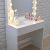 Close-up of White Vanity Table with LED Lights