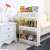 White 3-tier rolling shelf with wheels, perfect for kitchen storage