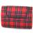 Red plaid picnic blanket with waterproof backing, rolled up and showing the handle