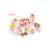 Pink pretend play cake set with 75 pieces, including cake slices, fruit, candles, and utensils