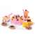 Pink pretend play cake set with 75 pieces, including cake slices, fruit, candles, and utensils