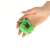 Green apple shaped electronic pet toy, Jia Yuan brand, held in hand