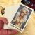 Közelkép a Queen of Wands tarot kártyáról az Ethereal Bloom Tarot pakliból, kézben tartva.