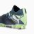 Puma FUTURE 7 MATCH FG/AG férfi focicipő, sarok és Puma logó közelről, sötétkék, világoszöld és lila mintával
