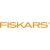 Fiskars logó, narancssárga szöveg fekete háttéren, a trágyavilla márkáját képviselve