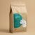 Craftbe Slim Rys Arabica Robusta extra blend kávébab kraft papír tasakban, hiúz illusztrációval világos háttéren, 250g