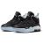 Egy pár Nike Air Jordan Stay Loyal 2 kosárlabda cipő, fekete, világoskék és fehér részletekkel, ferde nézet fehér háttéren