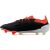 Adidas Predator Elite FG focicipő közeli képe, Strikeskin és HybridTouch felsőrész textúrájával, szögből nézve