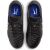 Felülről nézve egy pár Nike Tiempo Legend 10 Academy IC terem foci cipő, fekete kék talpbetéttel