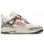 Nike Air Jordan Spizike Low férfi sneaker fehér, piros és szürke színben, oldalnézet átlátszó légtalppal fehér háttéren