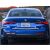 Kék BMW 4 Coupé 2020+ hátulnézete beépített króm csomagtér díszléccel, elegáns megjelenést mutatva