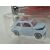 Ferde közelkép a Majorette Fiat 500 D 1:64 méretarányú modellautóról világoskék színben, még a bliszteres csomagolásban, elölről-jobb oldalról