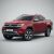 Piros Volkswagen Amarok 2 Pickup 2023-2025, ferde elölnézetből fehér háttéren, bemutatva a TEAMCAR autószőnyegekkel való kompatibilitást