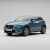 Kék Mazda CX-3 2015-2021 SUV autó TEAMCAR márkájú rendszámtáblával, bemutatva a szőnyegekkel kompatibilis járművet