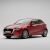 Vörös Mazda 2 DJ Facelift 5 ajtós ferdehátú autó semleges világos háttéren, bemutatva a TEAMCAR autószőnyegekkel kompatibilis járművet