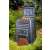 Keter Mega Composter 650L, black plastic compost bin, with compost material inside, open lid, outdoor use, garden setting