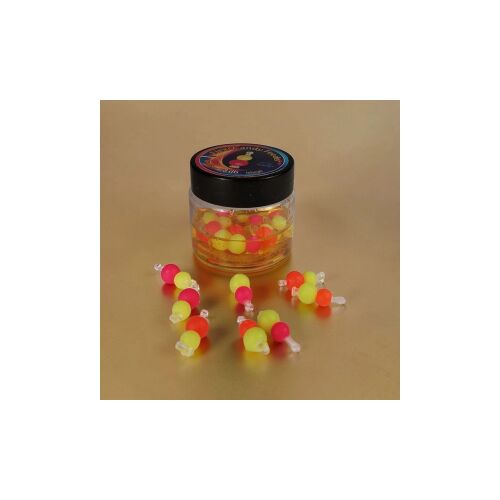 FLEXI CANDY FEEDER Mézes Fokhagyma pop-up horgászcsali átlátszó tégelyben, több színes, élénk sárga és rózsaszín lebegő műcsalival szétszórva arany háttéren. - PopUp