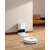 Dreame D10 Plus robot vacuum cleaner with self-emptying dustbin, white, and charging station