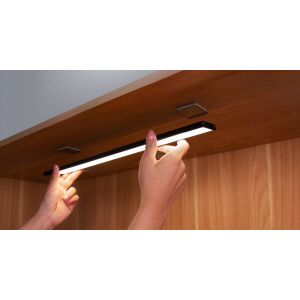 Yeelight Closet Light being installed under cabinet, motion sensor LED lighting - Furniture Lighting