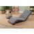 Atelier Del Sofa Nami egyszemélyes kanapéágy szürke színben, hátradöntött pihenő pozícióban, modern nappaliban növényekkel és dohányzóasztallal.