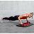 Woman using Springos Crivit portable crossfit station for push-ups