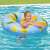 Woman relaxing on Bestway Scentsational lemon pool float, 119cm diameter, blue with lemon print