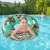 Girl using Bestway Floral Fantasy 114 cm inflatable swim ring with zebra and flamingo print