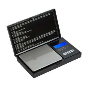 Black digital jewelry scale with a weighing platform and a backlit LCD display, showing the weight of an object in grams. - Other Measuring Tool