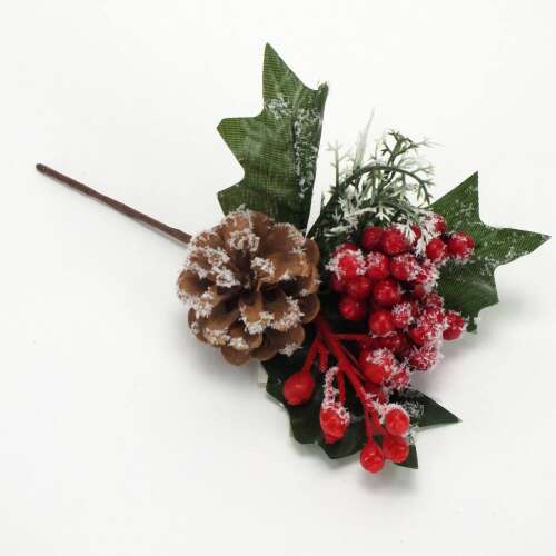 Snow-covered pine cone, red berries, and green leaves Christmas pick
