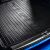 Közelkép a DRY ZONE TRUNK MAT INSERT BMW X1 U11 iX1 U11 2022-DZ csomagtértálcáról, bemutatva a bordázott textúrát és a 'DRY ZONE' logót enyhe kék autó belső tükröződéssel.