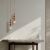 Két TK Lighting TOWER BRICK 10869 narancssárga függőlámpa egy modern konzolasztal felett egy kortárs szobabeállításban