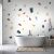 Fotótapéta - Terrazzo finom minta tapéta modern fürdőszobában, fehér káddal és fa szőnyeggel
