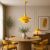 Opviq Chandelier Yellow Layer-20302-B modern étkezőben, hozzá illő sárga székekkel és asztali lámpával, meleg hangulatot teremtve