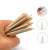 Orange wood cuticle sticks for manicure and pedicure, showing how to use them