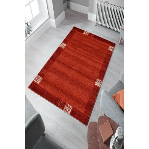 Conceptum Hypnose Többszínű Szőnyeg 60x100cm, piros mintás szőnyeg modern nappali környezetben, szürke bútorokkal és fehér radiátorral, bemutatva textúráját és designját - Szőnyeg
