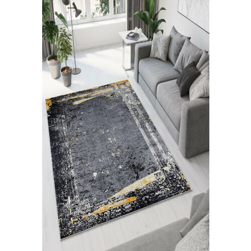 Conceptum Hypnose Multicolor W1149 Szőnyeg, 60x100 cm, modern absztrakt design, fekete és sárga árnyalatok, kortárs nappali berendezésben, szürke kanapéval - Szőnyeg