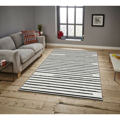 Conceptum Hypnose Carpet (100 x 180) Multicolor Asr Crpt-60, fekete-fehér csíkos szőnyeg modern nappaliban szürke kanapéval és fa padlóval, esztétikus környezet - Szőnyeg