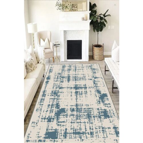 Conceptum Hypnose szőnyeg (100 x 160) Multicolor Vetrina egy hangulatos nappaliban kandallóval és fehér bútorokkal, absztrakt mintázatát és puha textúráját mutatva. - Szőnyeg