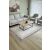 Conceptum Hypnose Carpet (80 x 150) Multicolor Ed modern nappali környezetben, világosszürke kanapéval, fa dohányzóasztallal és absztrakt festménnyel, bemutatva a szőnyeg mintázatát és méretét