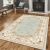 Conceptum Hypnose Hall Carpet (80 x 150) Multicolor Els1800 - Zöld, egy hangulatos nappaliban kandallóval és fotellel, kiemelve elegáns designját és alkalmasságát különböző otthoni belső terekbe