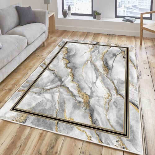Conceptum Hypnose Előszoba Szőnyeg (100 x 150) Többszínű Els2385 egy modern nappali környezetben, márványhatású mintával és arany részletekkel világos fa padlón. - Lakástextil