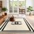 Conceptum Hypnose Carpet (60 x 100) Bézs Fekete Hmnt754 szőnyeg modern nappaliban barna bőr kanapéval és fa asztallal