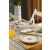 Hermia Reggeli Készlet 14 részes Kék NPMOD14KH8801093, kék-fehér mintás porcelán étkészlet reggelizőasztalon elrendezve narancslével és vázával, termék használat közben