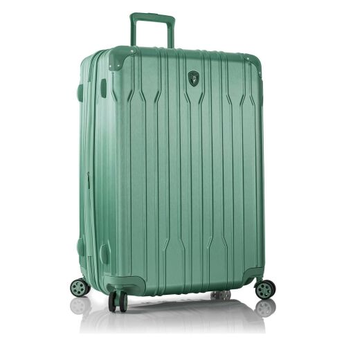 Heys Xtrak L Midnight green keményfedeles bőrönd, ferde nézetben a négy forgó kerékkel és a bordázott textúrával - Divat és öltözködés