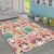 Conceptum Hypnose Carpet 140 x 220 Multicolor Hmı Kdc-47 gyerekszobában, világoskék falakkal és emeletes ágyakkal, a teljes szőnyeg gomba mintával