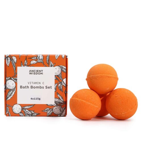 Ancient Wisdom C-vitaminos Fürdőbomba Készlet ajándékdoboz három narancssárga fürdőbombából álló halom és egy különálló fürdőbomba mellett, mind fehér háttéren - Fürdőgolyó és fürdőbomba