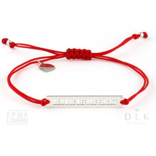 Piros zsinóros karkötő kivágott "Remove Before Flight" felirattal 179061495 - Női karkötő