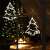 LED Christmas tree window decoration, warm white light, battery operated, hanging on window