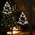 LED Christmas tree window decoration, warm white light, battery operated, hanging on window